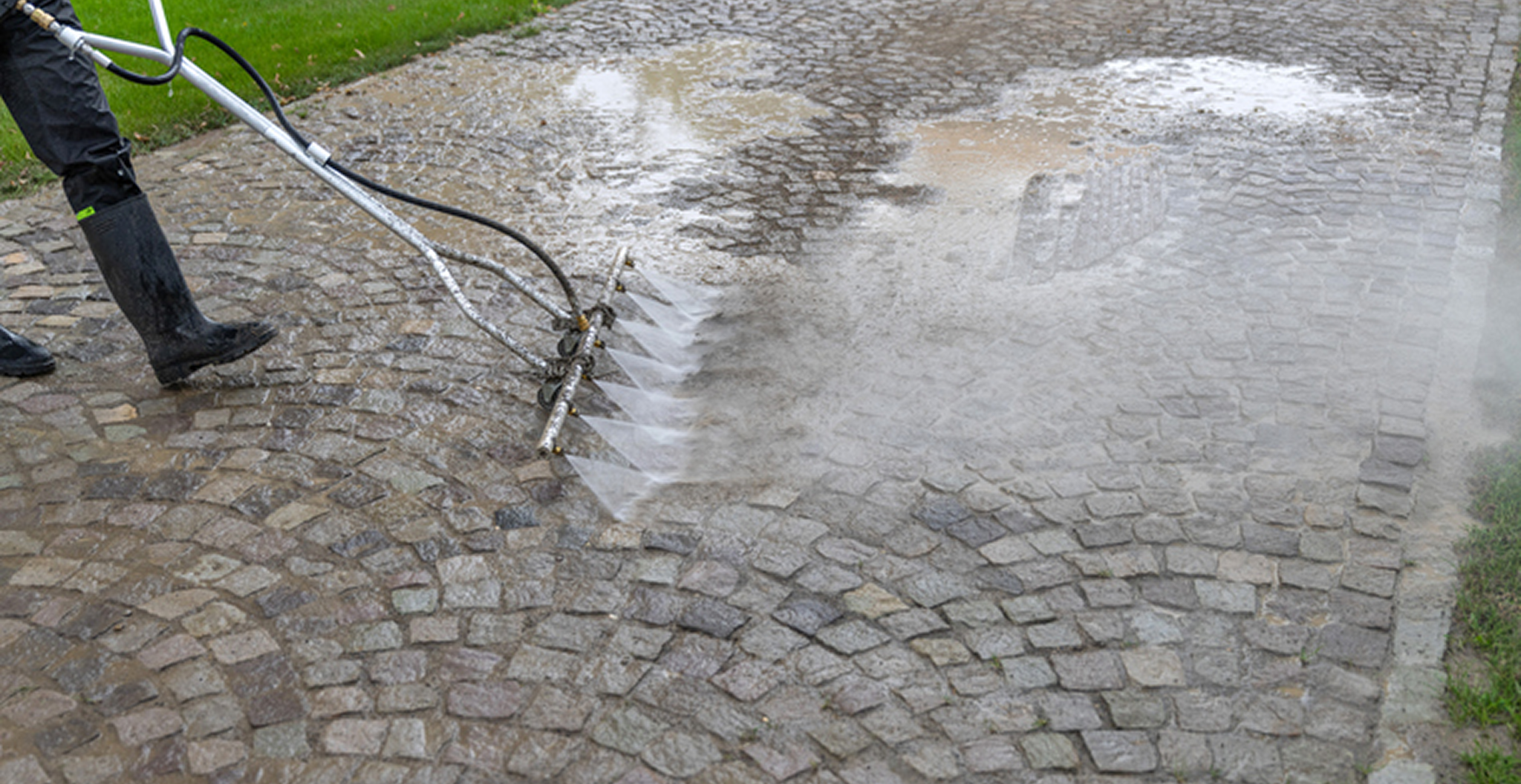 Cleaning cobblestone with high-pressure washer