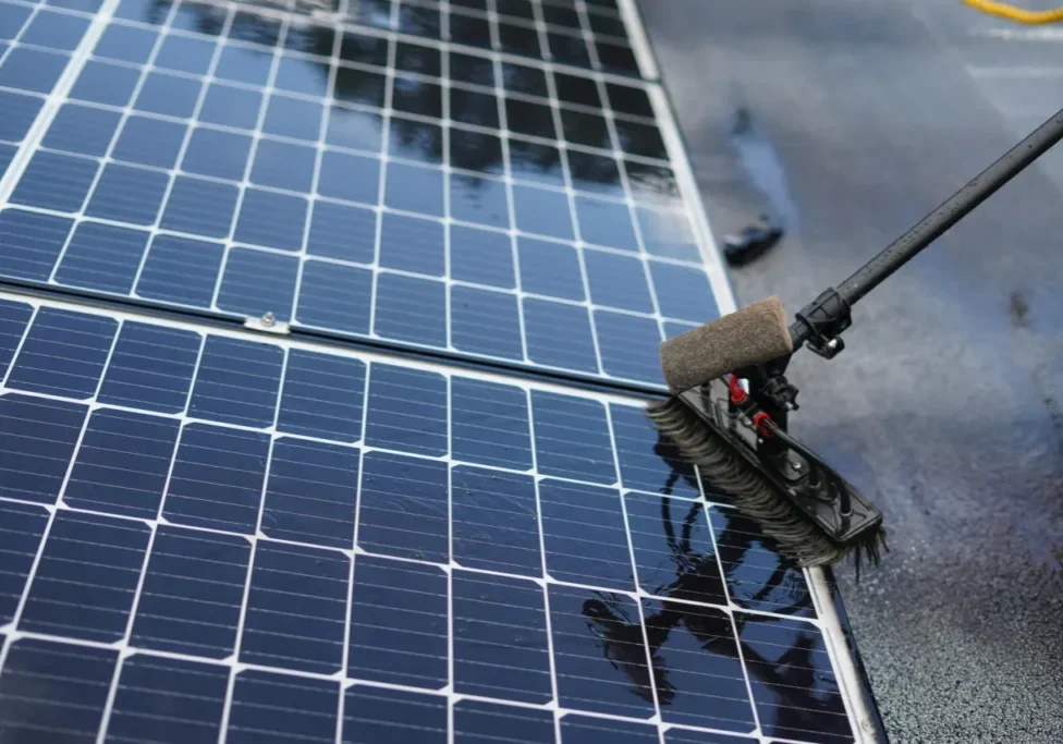 Solar panel surface being cleaned